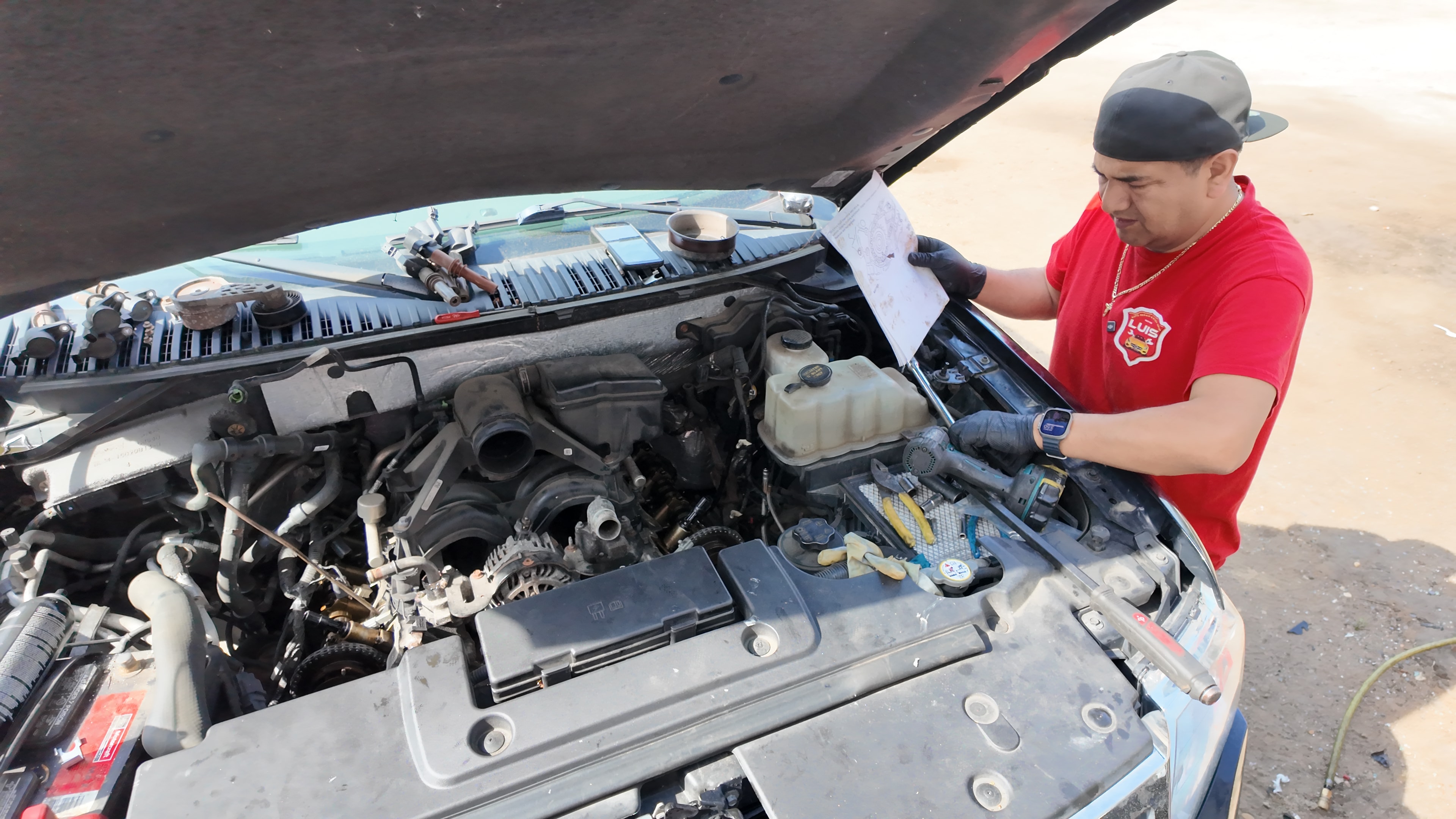 Computer diagnostics being run on a car engine